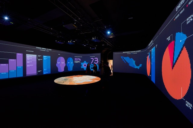 The animated infographics fill the walls of the installation at the London Design Biennale.